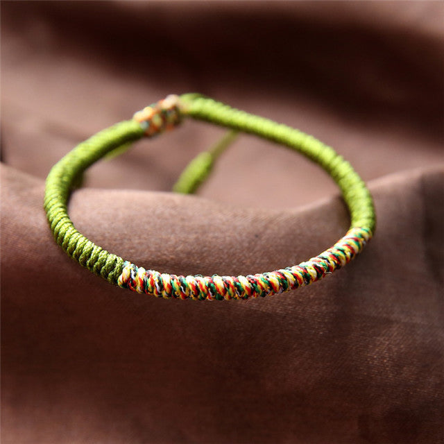 Bracelet tibétain en coton tressé vert