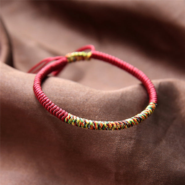 Bracelet tibétain en coton tressé rouge bordeaux